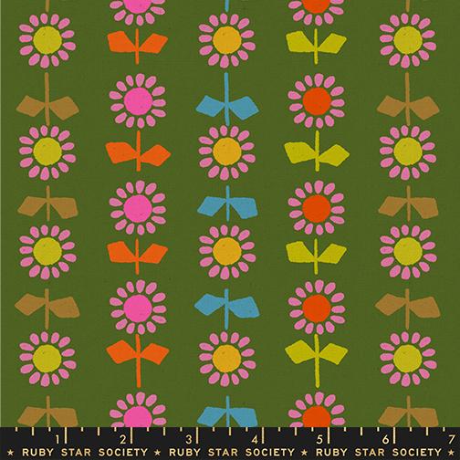 Patterned fabric with colorful flowers and leaves on a green background, featuring Ruby Star Society label.