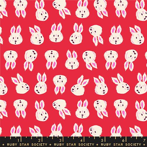 Pattern of white bunnies with pink ears on a red background with Ruby Star Society label