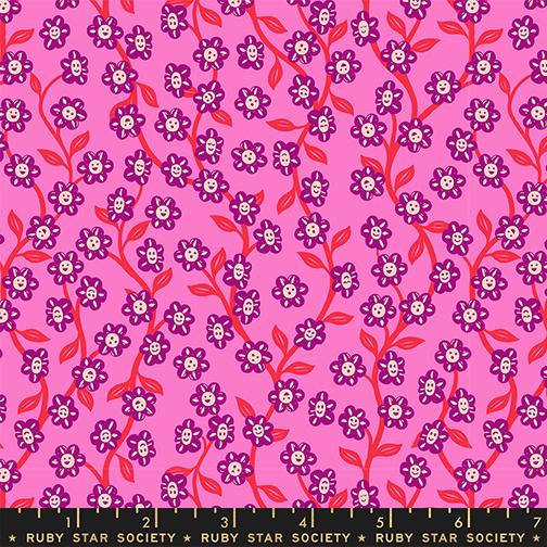 Floral pattern with purple flowers with faces and red stems on a pink background, featuring Ruby Star Society label.