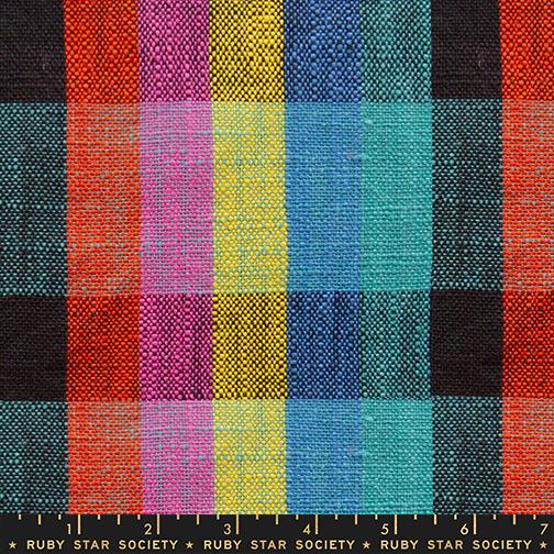 Fabric swatch with a checkered pattern in various colors, featuring Ruby Star Society label.
