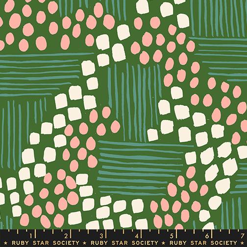 Patterned fabric with pink, white, and green shapes on a green background, featuring Ruby Star Society label.