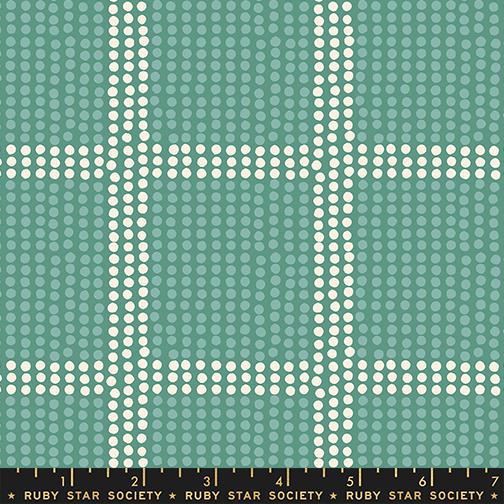 Fabric pattern with white dots on a teal background, featuring Ruby Star Society label.