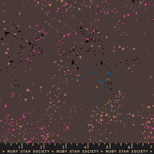 Fabric with colorful dot pattern on a brown background, featuring Ruby Star Society label.