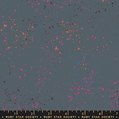 Fabric swatch with colorful dot pattern on a blue background, featuring Ruby Star Society label.