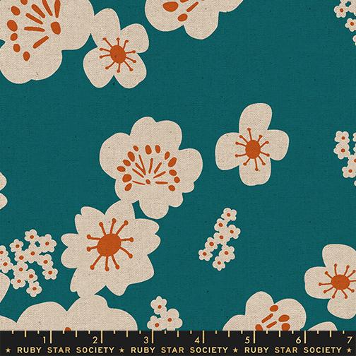 Orange and white patterned floral on a blue background with Ruby Star Society label
