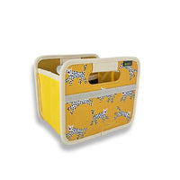 yellow storage box with white spotted snow leopard print