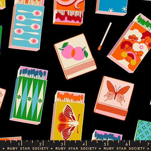 Colorful matchbooks on a black background with Ruby Star Society label