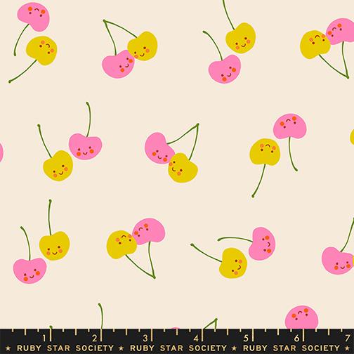 Pattern of smiling cherries on a beige background with a ruler at the bottom.