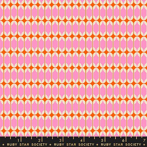 Patterned fabric with pink and white shapes on an orange background, featuring Ruby Star Society label.