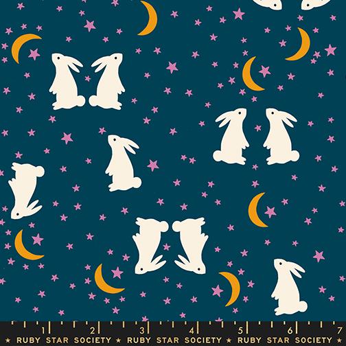 Pattern of white rabbits, pink stars, and yellow crescent moons on a navy background. Ruby Star Society label at the bottom.