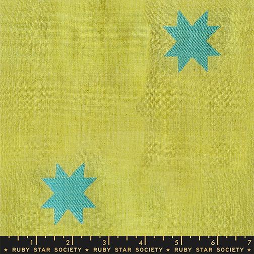 Fabric swatch with turquoise stars on a yellow background, featuring Ruby Star Society label.