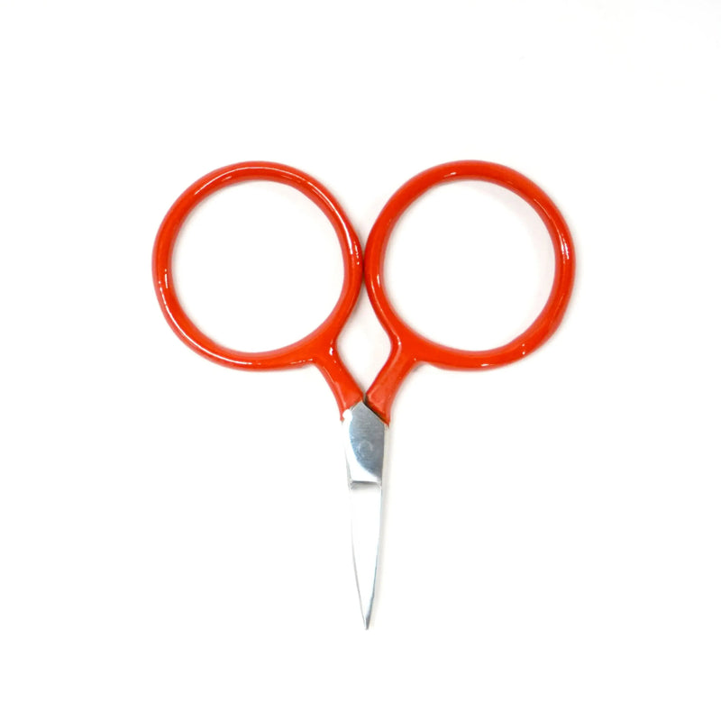 Red scissors with a white background