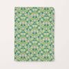 Floral patterned notebook on a light green background