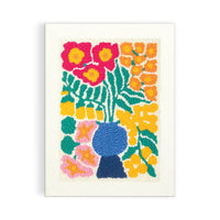 Colorful floral design with a blue vase on a white background