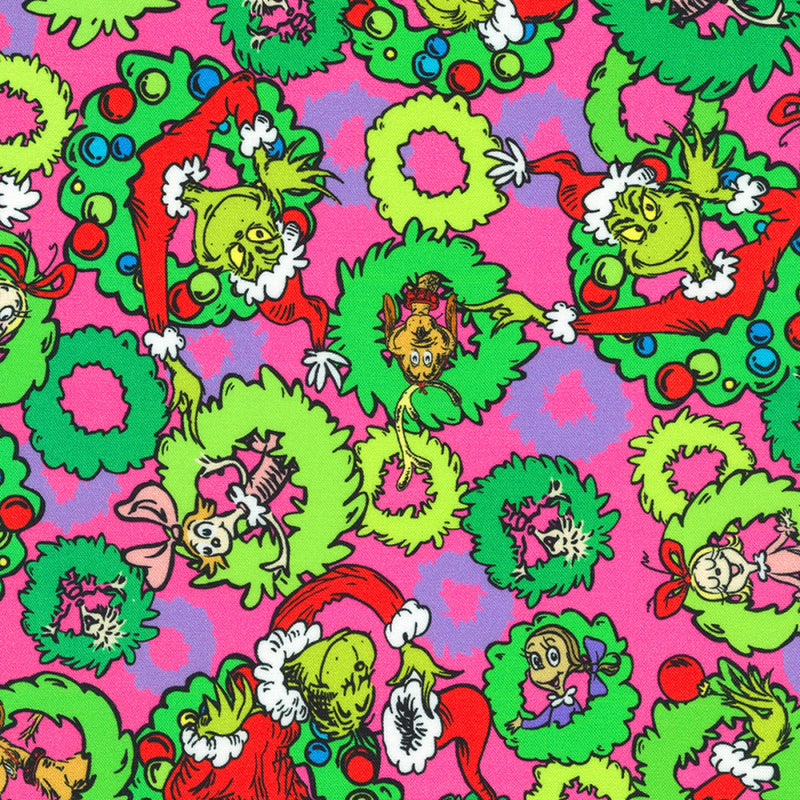 Pattern of Grinch characters with festive elements on a pink background
