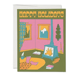 Card with in retro colors that reads Happy Holidays  and has someone's feet sitting by the fire
