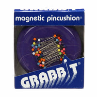 Magnetic pincushion in a deep purple with rainbow pins