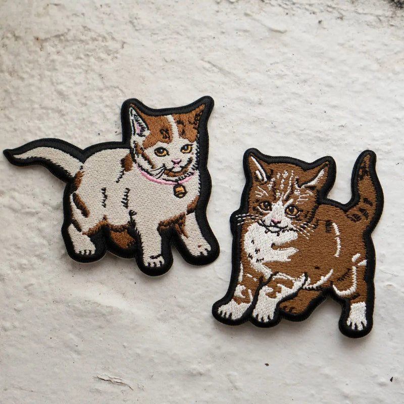 Two kittens as sticky patches