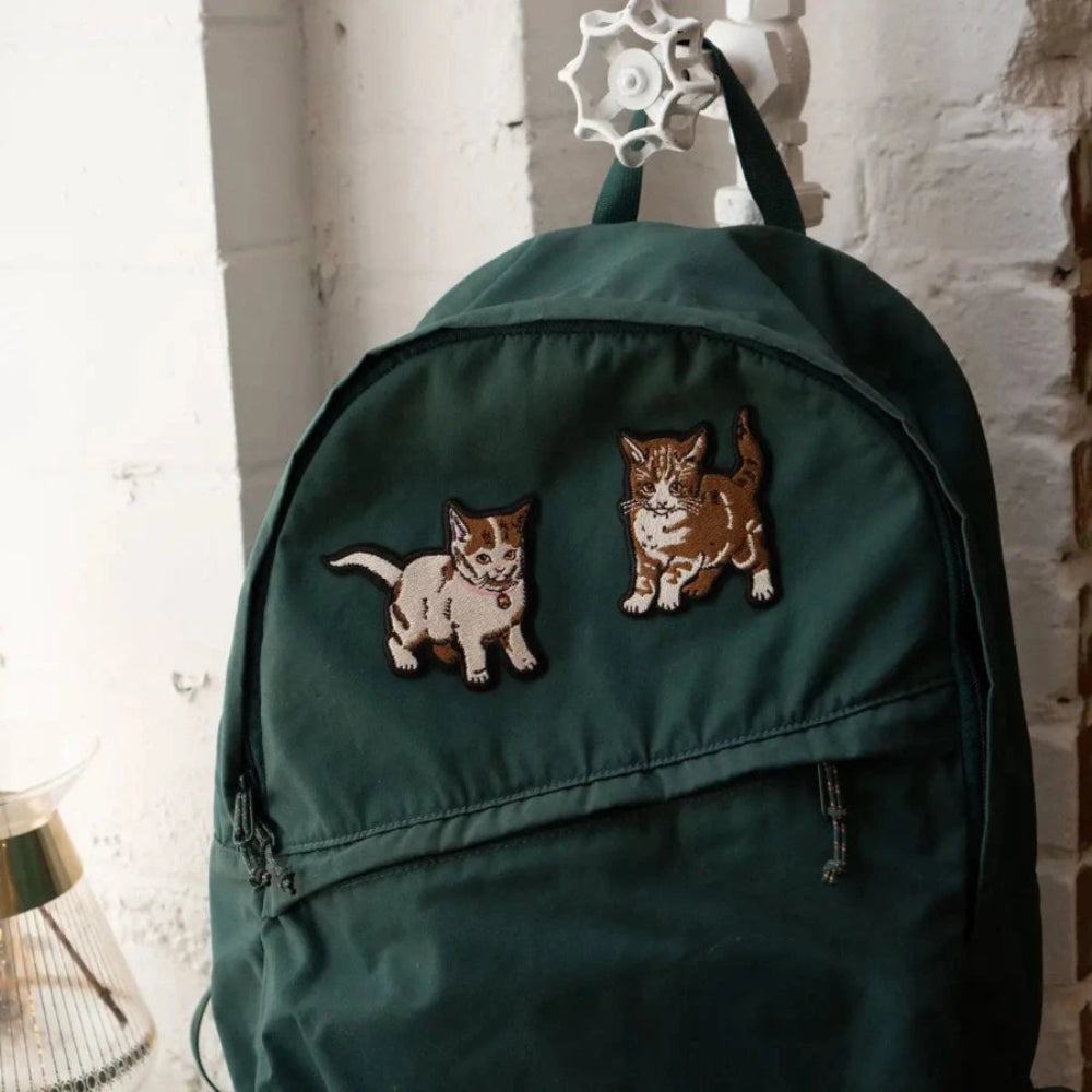 Kitten patches on backpack for an example of how they look applied :)