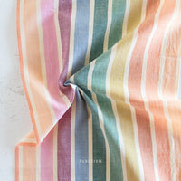 Colorful striped fabric with a soft texture on a light background