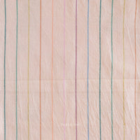 Textured fabric with multicolored vertical stripes on a light pink background