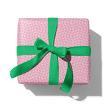 Pink wrapping paper with wavy red grid
