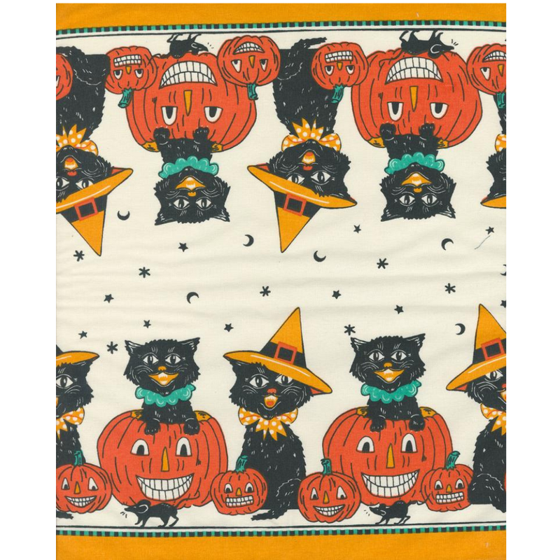 Halloween-themed fabric with black cats, orange pumpkins, and witch hats on a white background.