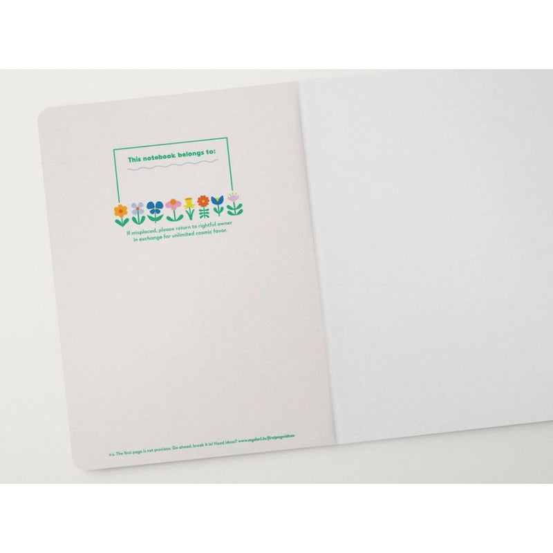 Notebook with floral design and text on a white background