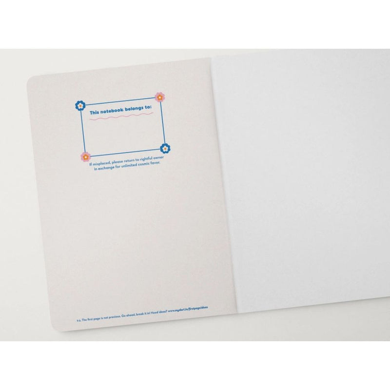 Notebook with a design on the cover and white pages inside