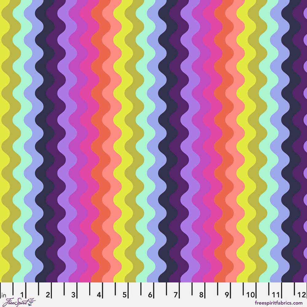 Colorful wavy pattern fabric swatch with a ruler at the bottom