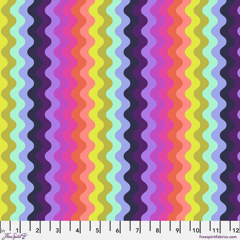 Colorful wavy pattern fabric swatch with a ruler at the bottom