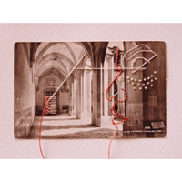 photo of a hallway with abstract red and white embroidered elements