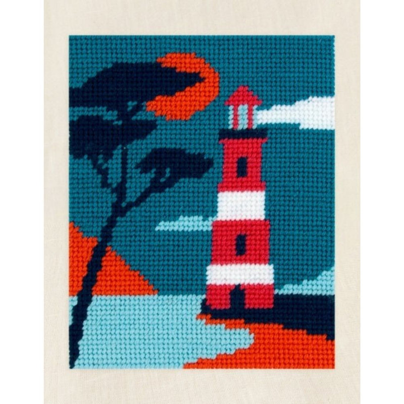 Needlepoint-stitched design of a lighthouse with a tree and sunset on a blue background
