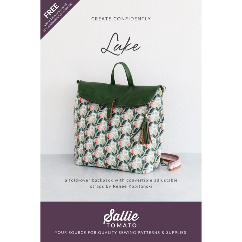 Floral backpack with green accents on a white background, featuring 'Lake' pattern by Sallie Tomato.
