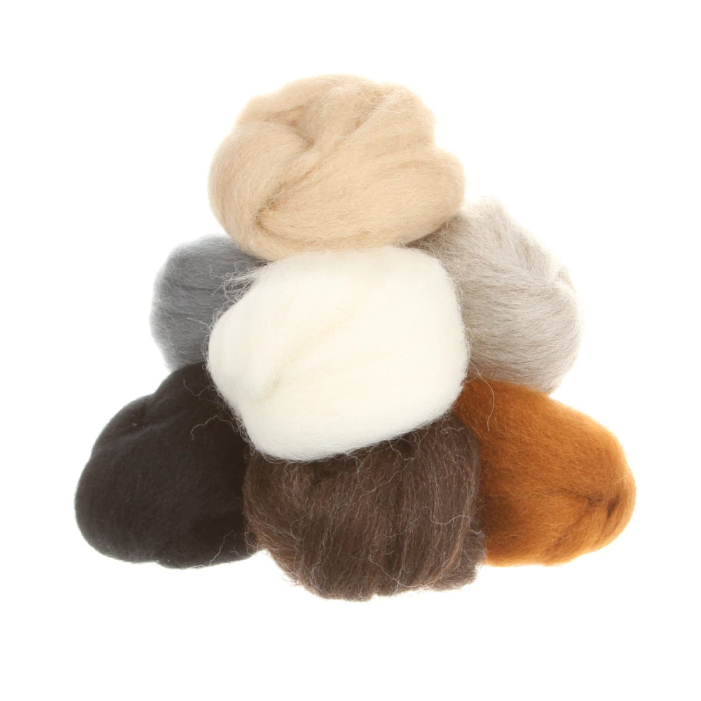Set of six assorted colored roving balls on a white background
