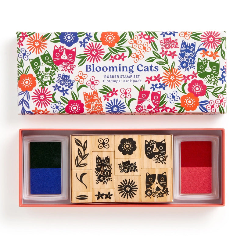 stamp set with pink, blue, green, and orange cats and flowers on the box with wooden stamps inside