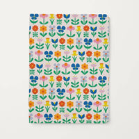 Notebook with a colorful floral pattern on a white background