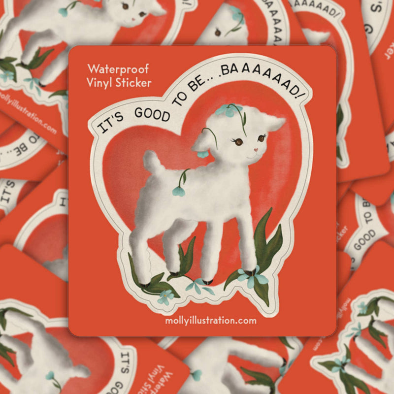 Sticker with a white lamb design and text on a red background, surrounded by more stickers.