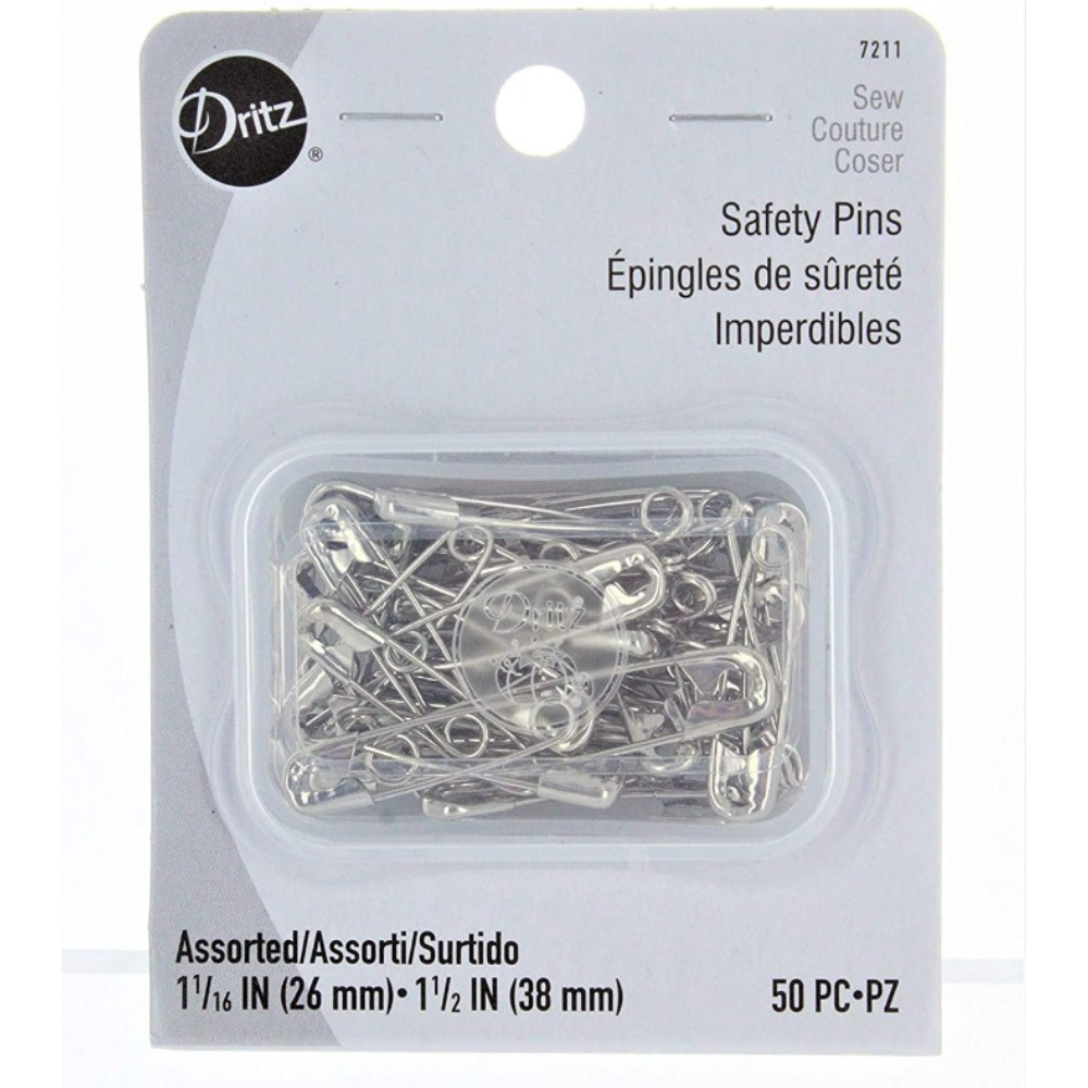 Box of safety pins on white Dritz packaging