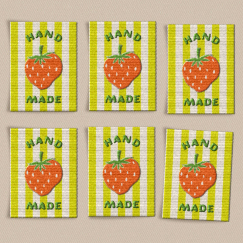 Six labels with strawberry design and 'Hand Made' text on a striped background.