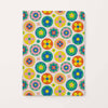 Notebook with colorful floral pattern on a white background
