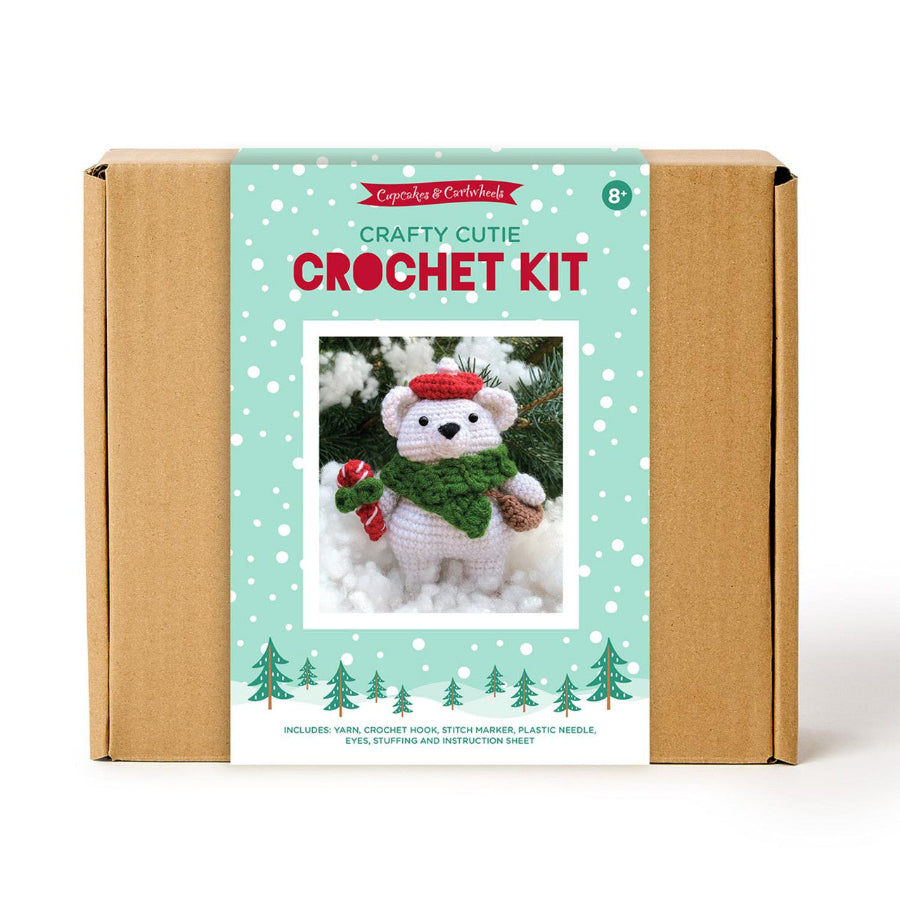 Crochet kit packaging with a teddy bear design on a white background