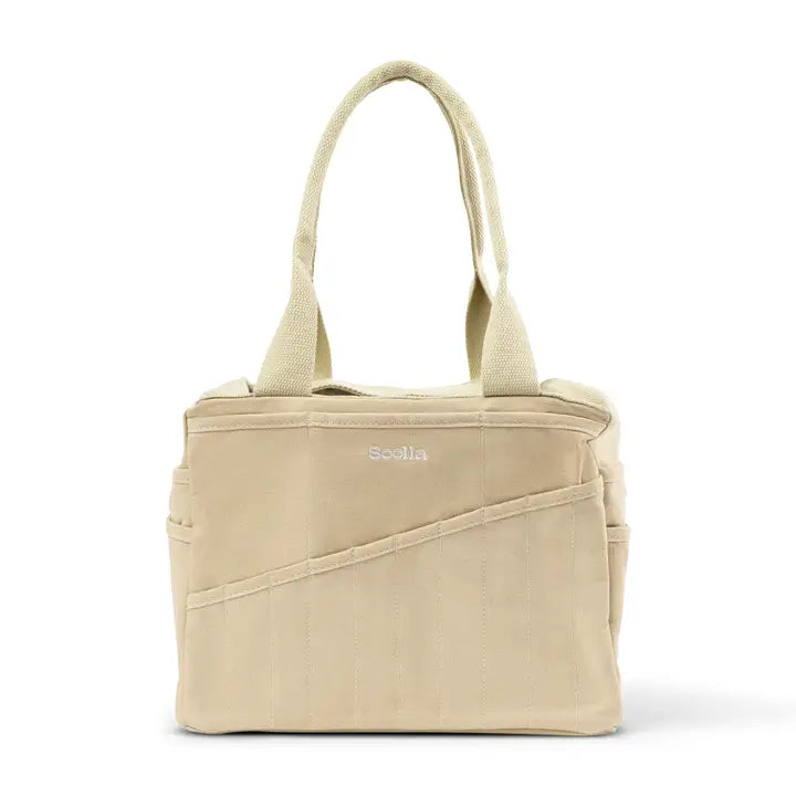 Beige tote bag with 'Soolia' branding on a white background