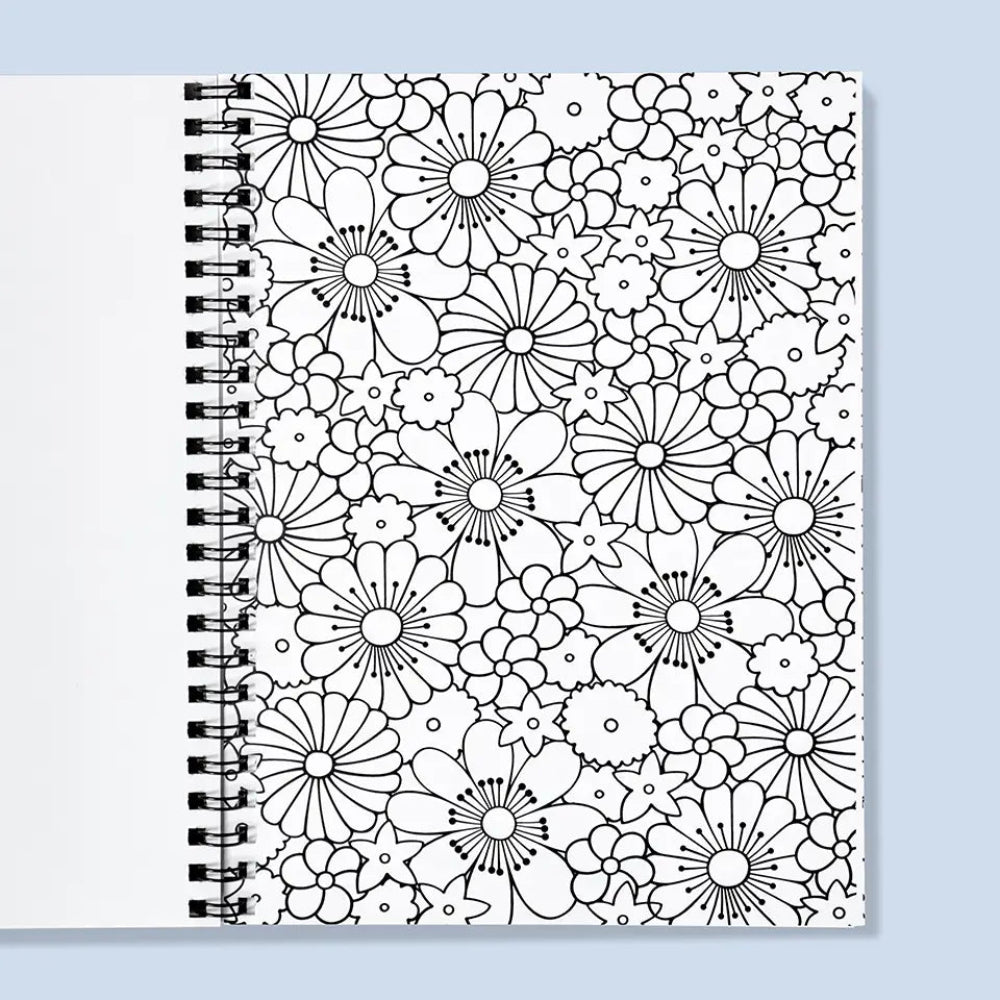 Coloring book with black floral patterns on a light blue background