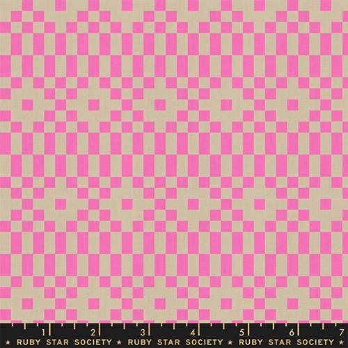 Fabric with a pixelated geometric design in neon pink and tan.