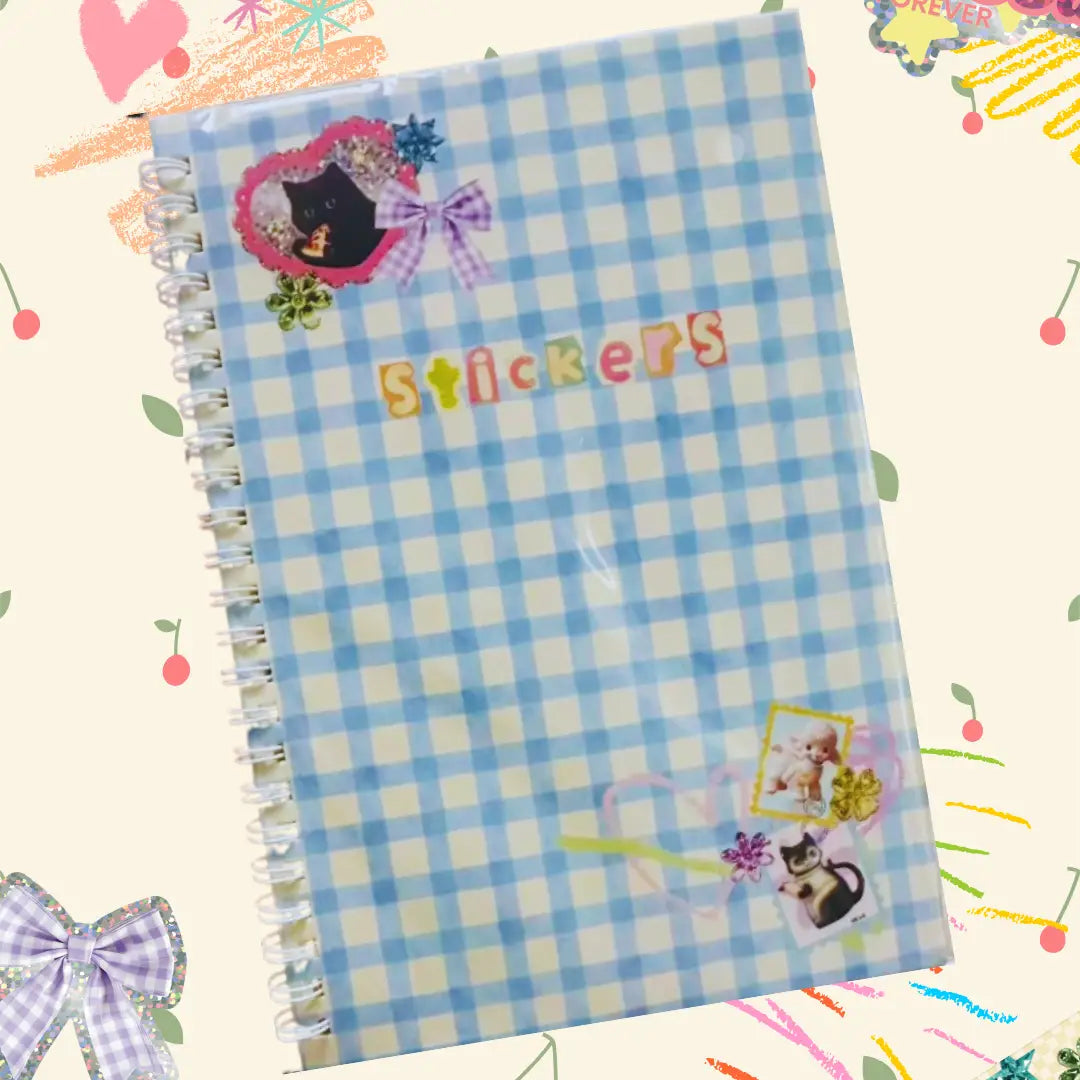 Notebook with blue and white checkered pattern and 'Stickers' text on a colorful background