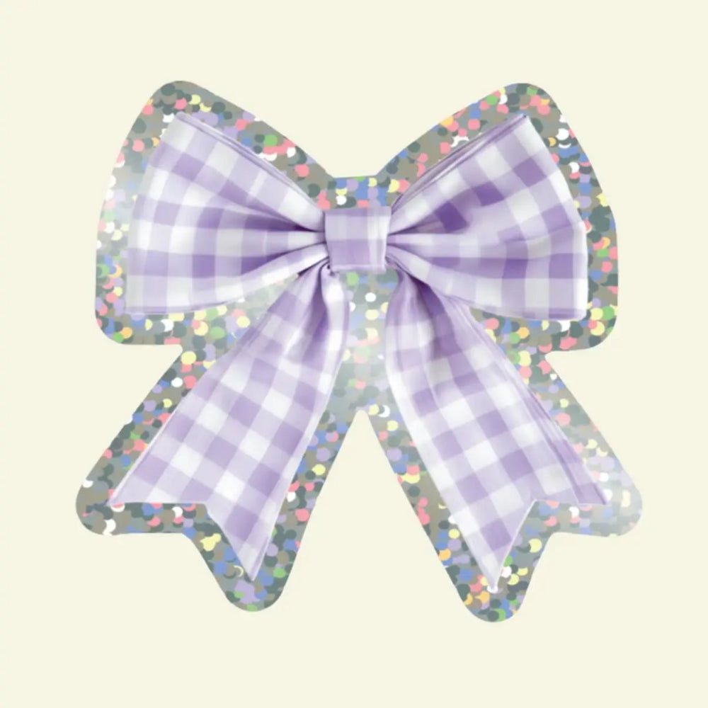 Purple gingham bow with glittery edges on a beige background