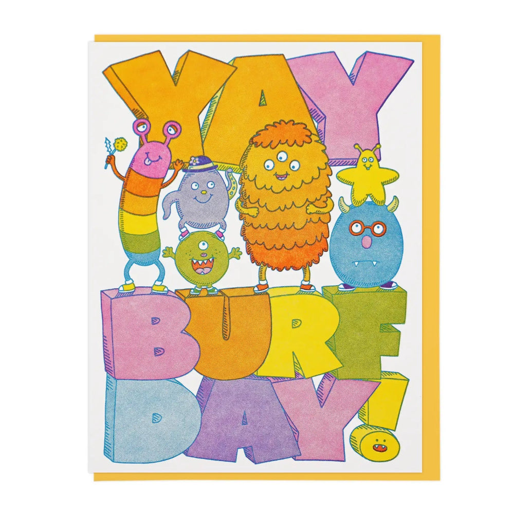 Colorful birthday card with cartoon monsters on a white background. The text on the card reads " Yay Burfday!".