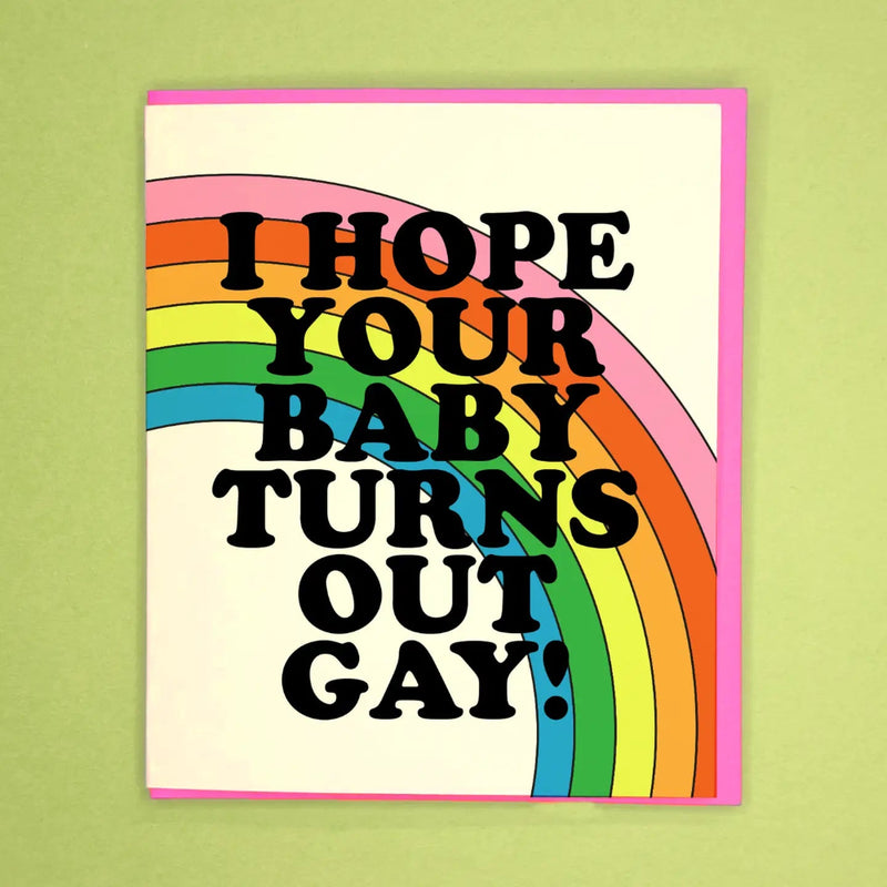Card with rainbow design and text on a green background