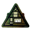 Decorative sticker of a haunted house with ghosts on a white background